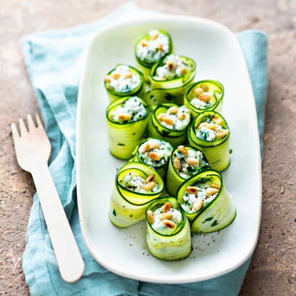 a plate of cucumber rolls